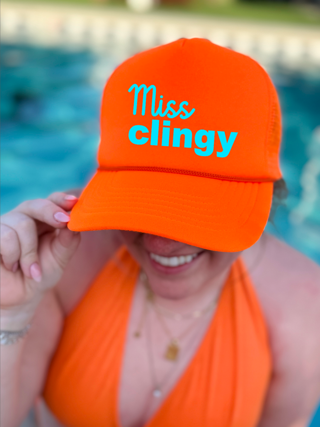 Miss Clingy Neon Orange Trucker Hat