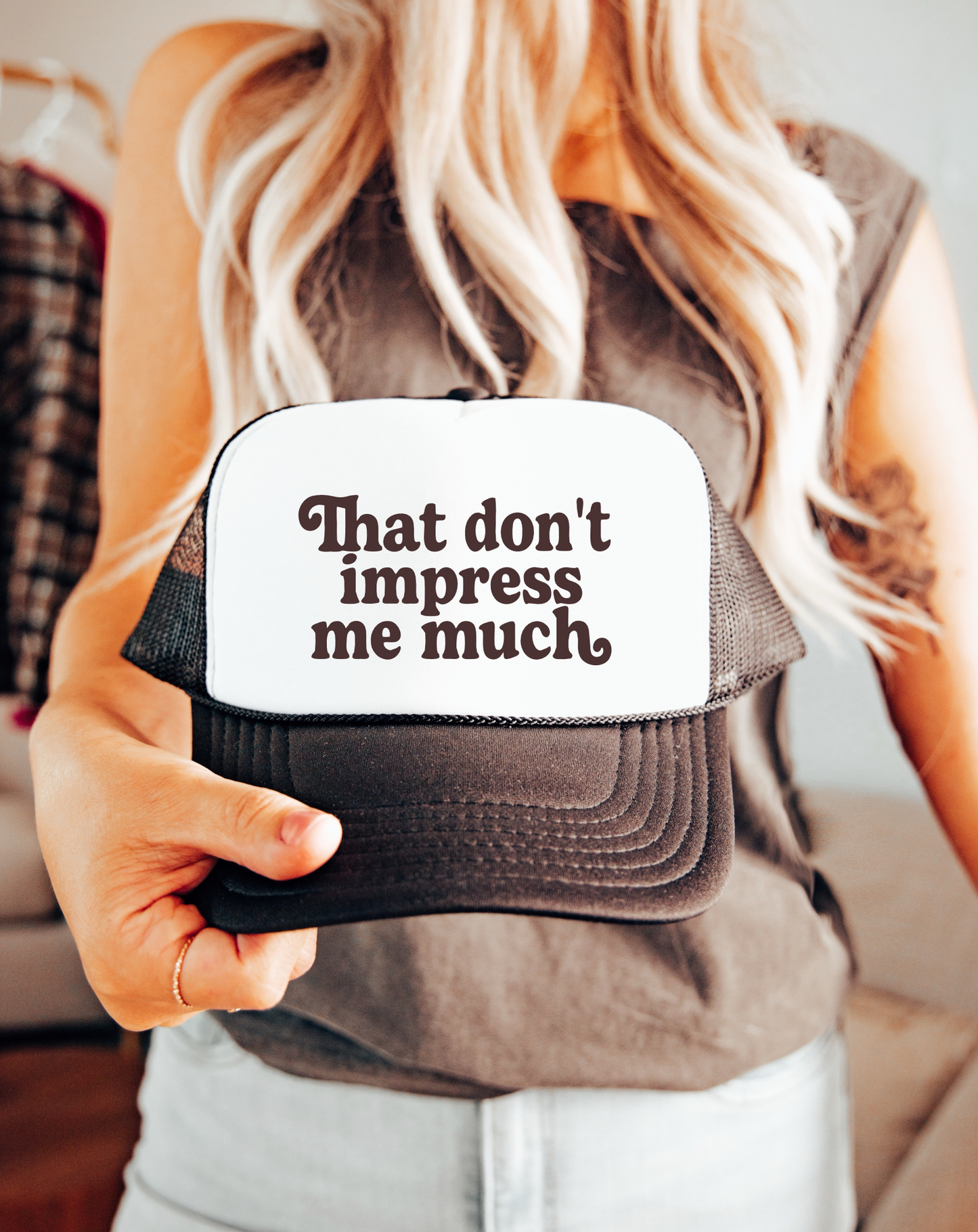 That Don't Impress Me Much TRUCKER CAP BWNWHT